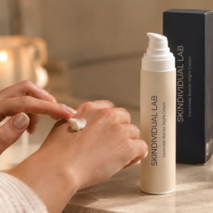 Applying Skindividual Lab Ceramide Barrier Night Cream to the back of the hand