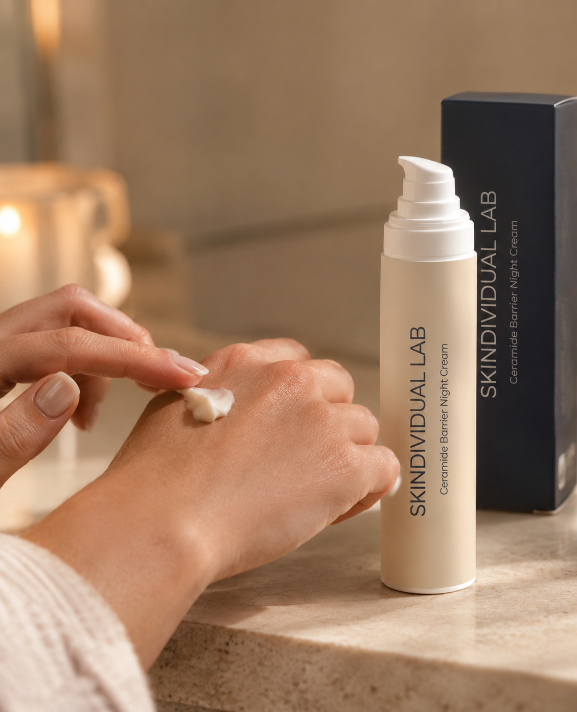 Applying Skindividual Lab Ceramide Barrier Night Cream to the back of the hand