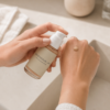 Applying Skindividual Lab Tinted Sunscreen SPF30 to the back of the hand